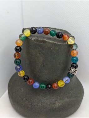 Hand Crafted Rainbow Beaded Bracelet with Silver Accent